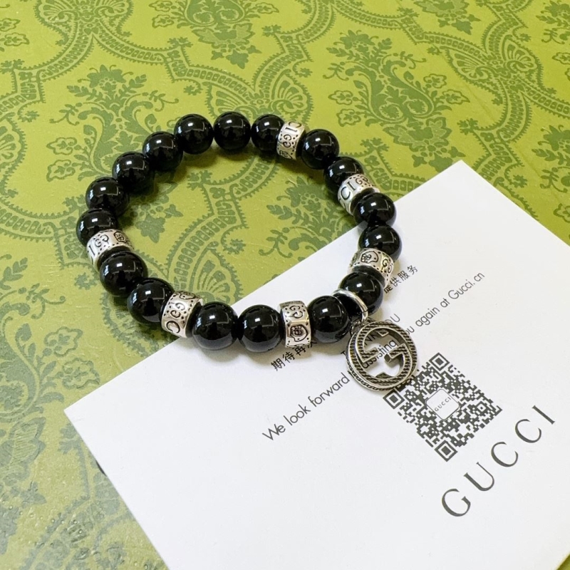 G*u*i bracelets